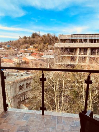 a view from the balcony of a building at City Heart Luxury Apartment in Kutaisi