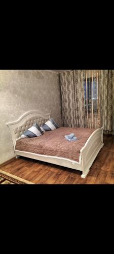 En eller flere senger på et rom på 1 комнатная квартира Центр