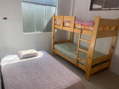 Tempat tidur susun dalam kamar di Verano en Boca del Río
