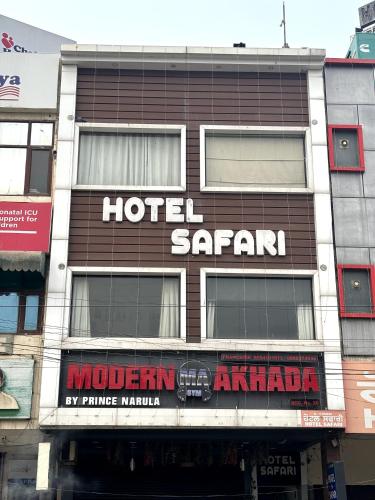 a hotel saari sign on the side of a building at Hotel The Safari in Zirakpur