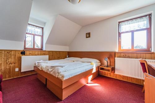Katil atau katil-katil dalam bilik di Nad Vodopády