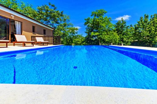 a swimming pool in a house at Villa Ferlini in Central Istria with private 10000 m2 Garden in Svetvinčenat