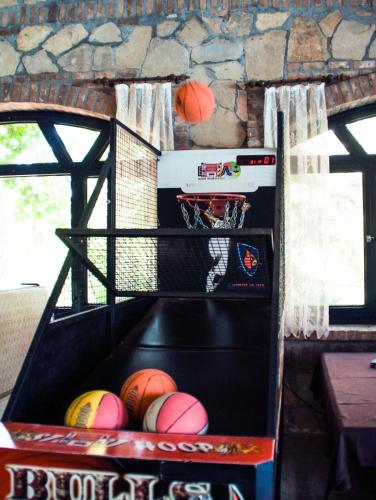 a basket full of basketballs in at Belkon Hotel in Belek