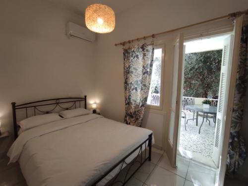 Ένα ή περισσότερα κρεβάτια σε δωμάτιο στο Gina's cozy home