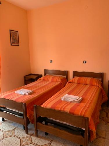 Кровать или кровати в номере Hotel Villa Carla