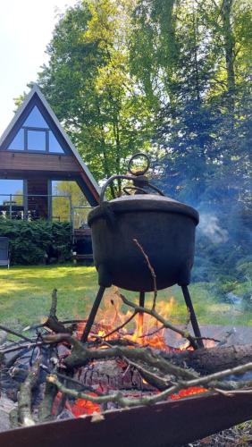 a pot sitting on top of a camp fire at U Hanki in Żywiec