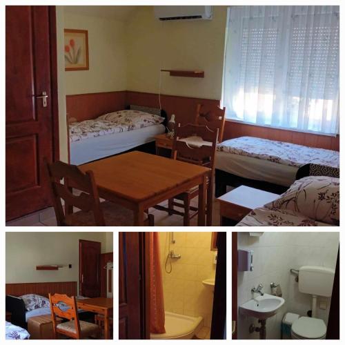 ナジカニジャにあるペリカン サーラーシのベッド2台、テーブル、バスルームが備わる客室です。