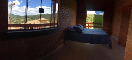 Ein Bett oder Betten in einem Zimmer der Unterkunft Casa do bosque