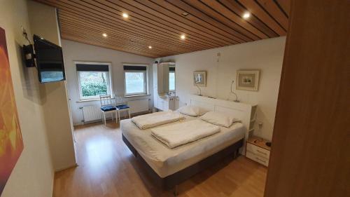 Postel nebo postele na pokoji v ubytování Bungalow Uthof