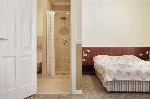 Consul Hotel Консулにあるベッド