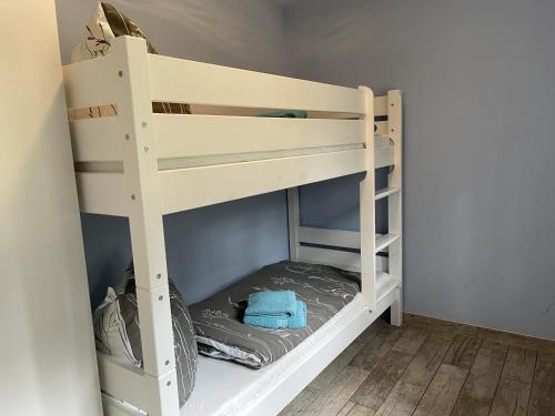 Postel nebo postele na pokoji v ubytování Ferienhaus Eichhörnchen