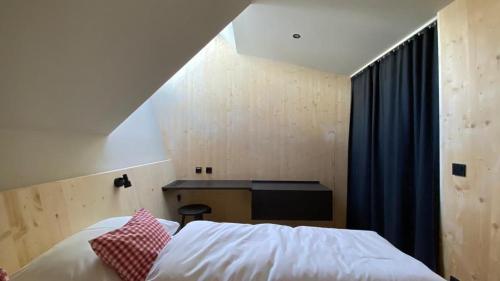 Voodi või voodid majutusasutuse Hideaway Planneralm operated by JUFA Hotels toas