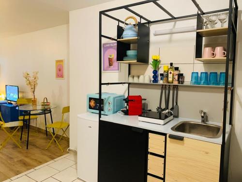 Kuchyň nebo kuchyňský kout v ubytování cocooning modern design studio