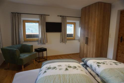 Postel nebo postele na pokoji v ubytování Apartments Edinger