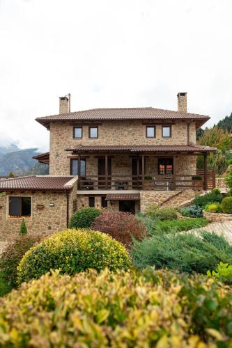 a house on a hill with a garden at Anotopos in Ano Trikala