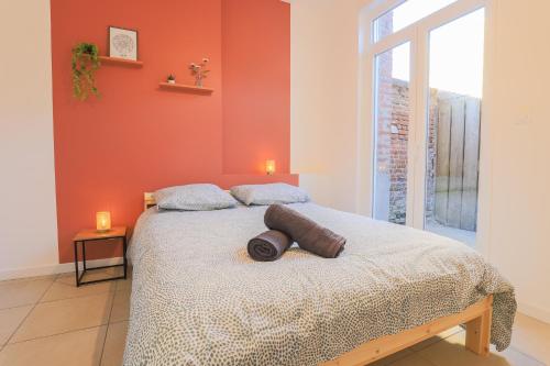 Ένα ή περισσότερα κρεβάτια σε δωμάτιο στο Appartement Élégant Arrière Gare