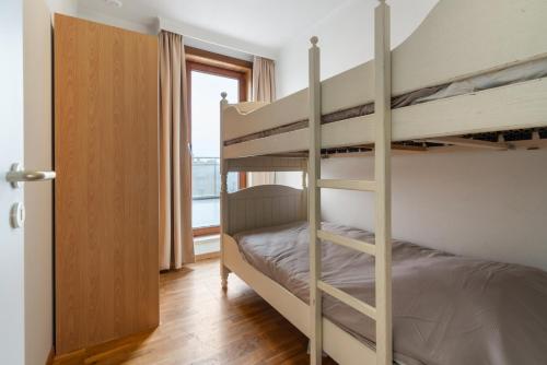 En eller flere senge i et værelse på Riverside 0902