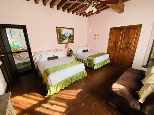Кровать или кровати в номере Villa Bonita Les Terrasses
