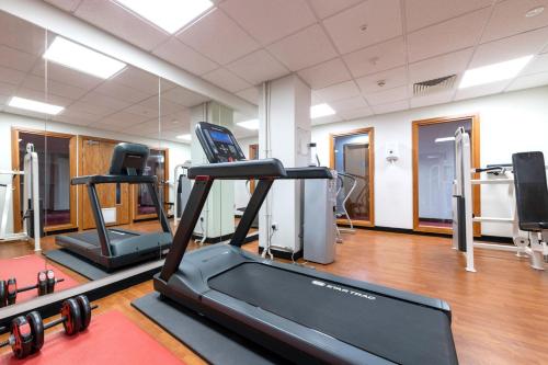 a gym with two treadmills and a treadmill at For Student Only City Living Studios in the heart of Coventry at Market Way in Coventry