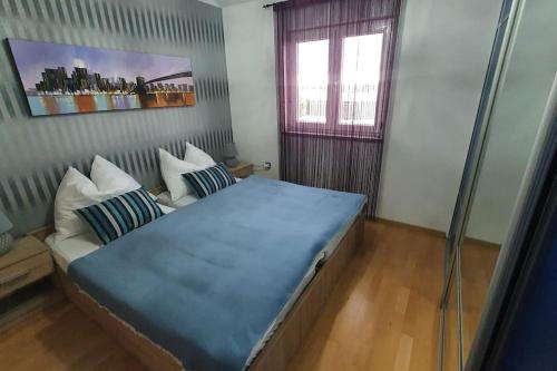 Postel nebo postele na pokoji v ubytování Apartment Mary