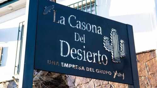 ein Schild für die Casa del Desabre in der Unterkunft Hotel La Casona del Desierto in Huasco