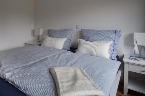 Ein Bett oder Betten in einem Zimmer der Unterkunft Ferienhaus Heideland Winsen Aller