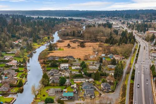 an aerial view of a town next to a river at Serenity Shores in Kenmore in Kenmore