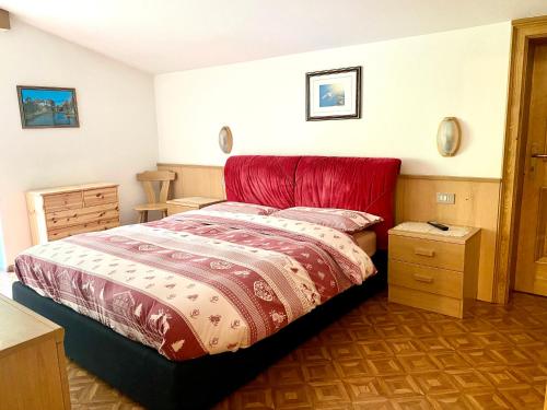Кровать или кровати в номере Appartamento Fodom