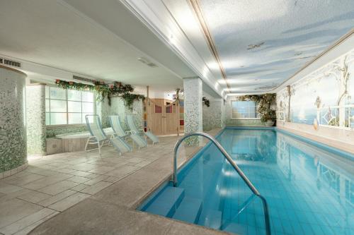 Bazén v ubytování Piccolo Hotel nebo v jeho okolí