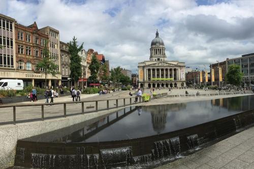a view of a city with a building and a river at Studio with Great City Views in Nottingham