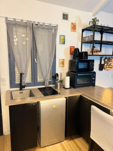 Photo de la galerie de l'établissement Maisonnette proche de Paris & Home cinema, à Bourg-la-Reine