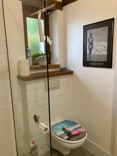 a bathroom with a shower and a toilet at Stunning rural gem with pool in southwest France in Brie-sous-Barbezieux