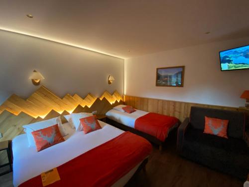 Postel nebo postele na pokoji v ubytování Hôtel du Grand-Mont