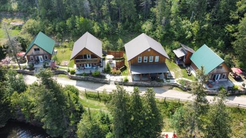 an aerial view of a house in the mountains at BAYSIDE RESORT, 2 O'CLOCK SUITES in Manitowaning