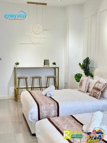 Ένα ή περισσότερα κρεβάτια σε δωμάτιο στο Imperio Residence By Heystay Management