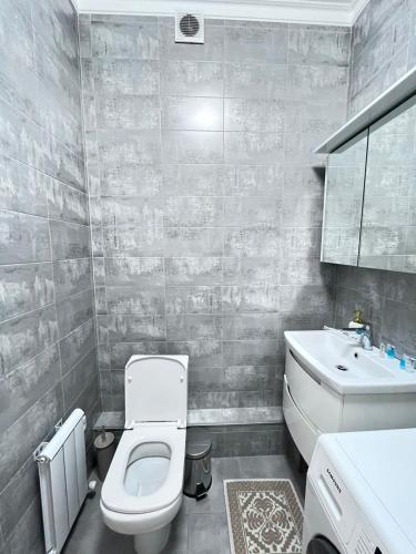 Um banheiro em Апартаменты в ЖК Легенда