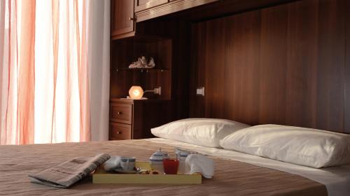 Ένα ή περισσότερα κρεβάτια σε δωμάτιο στο Agriturismo La Violetta
