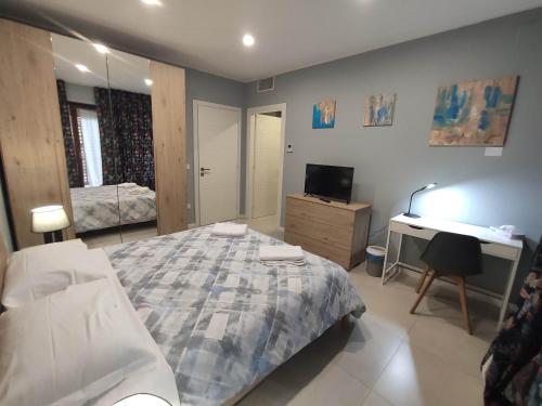 Ένα ή περισσότερα κρεβάτια σε δωμάτιο στο GArt Riviera B&B