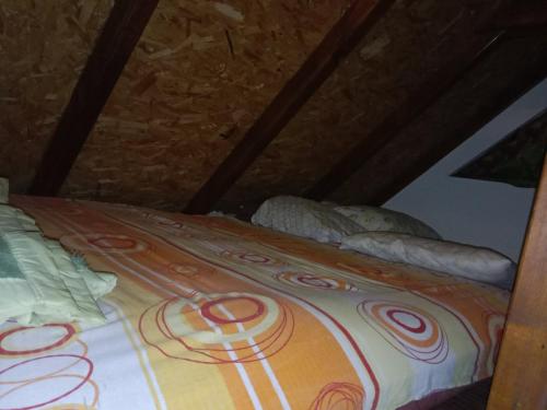 Una cama o camas en una habitación de Mala Kelja Lux