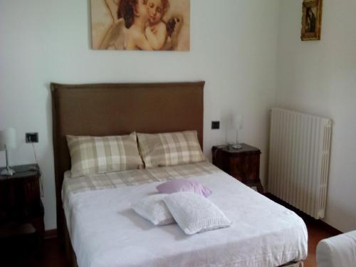 Postel nebo postele na pokoji v ubytování Crespi House