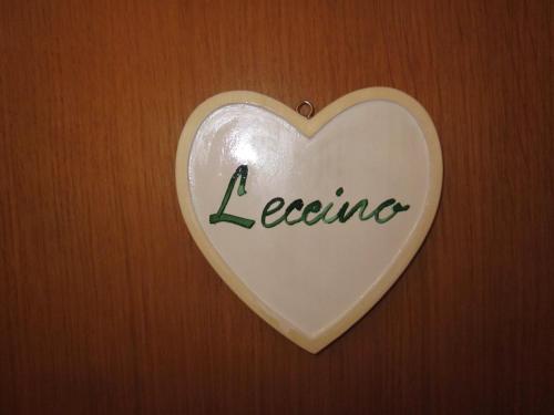 a heart shaped sign with the word leene on it at villa oliveta in San Gimignano
