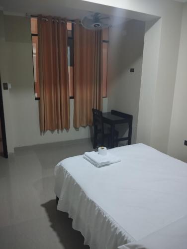 Postel nebo postele na pokoji v ubytování Hotel Amazon deluxe