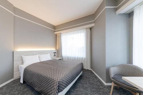 Кровать или кровати в номере The One Five Garden Kurashiki - Vacation STAY 40168v