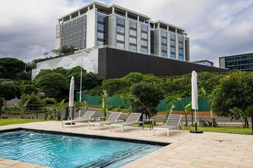 Πισίνα στο ή κοντά στο Penthouse 180° Luxury Ocean Suites - #405