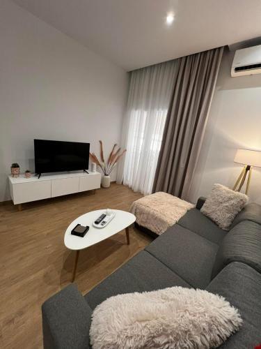 TV a/nebo společenská místnost v ubytování La Maison Luxury