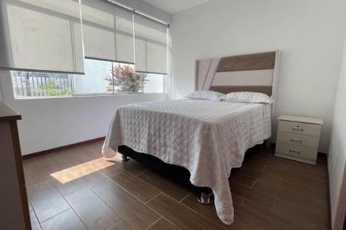 Postel nebo postele na pokoji v ubytování Apartamentos Privados A1