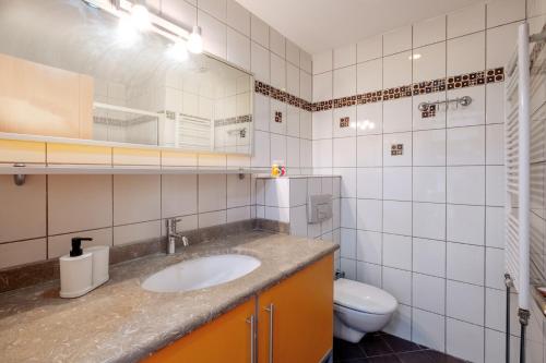 a bathroom with a sink and a toilet at Flat with Terrace Close to Transit in Ankara in Ankara