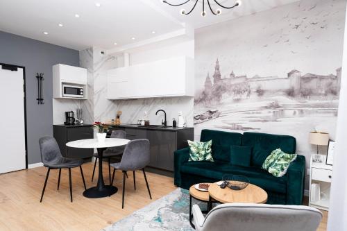 Kuchyňa alebo kuchynka v ubytovaní krakow dream apartment