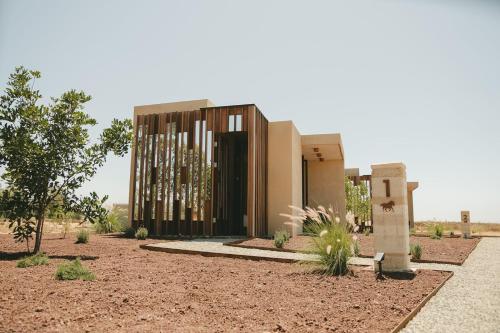 a rendering of a building in the desert at Equ Hotel de Tierra in El Porvenir