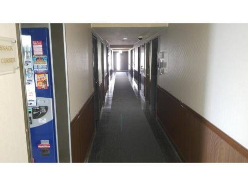 a hallway in a hospital with a vending machine at My Hotel Okazaki - Vacation STAY 40801v in Okazaki